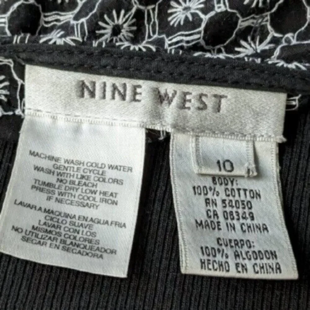 Beautiful Black and White Nine West skirt with embordered fabric